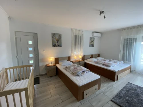 A 6 szoba egyike - 3 fekvőhely + kiságy